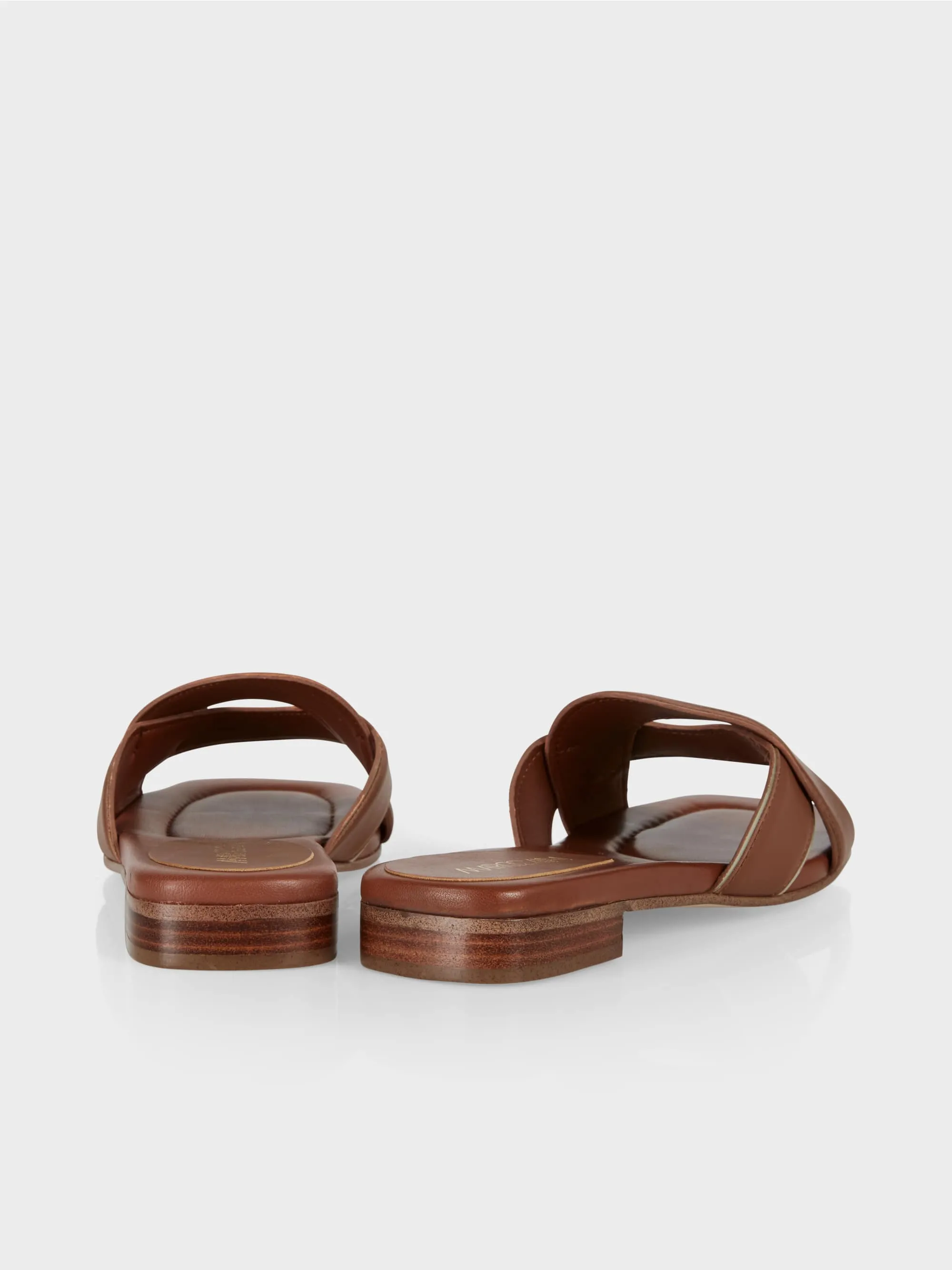 eye-catching leather mules